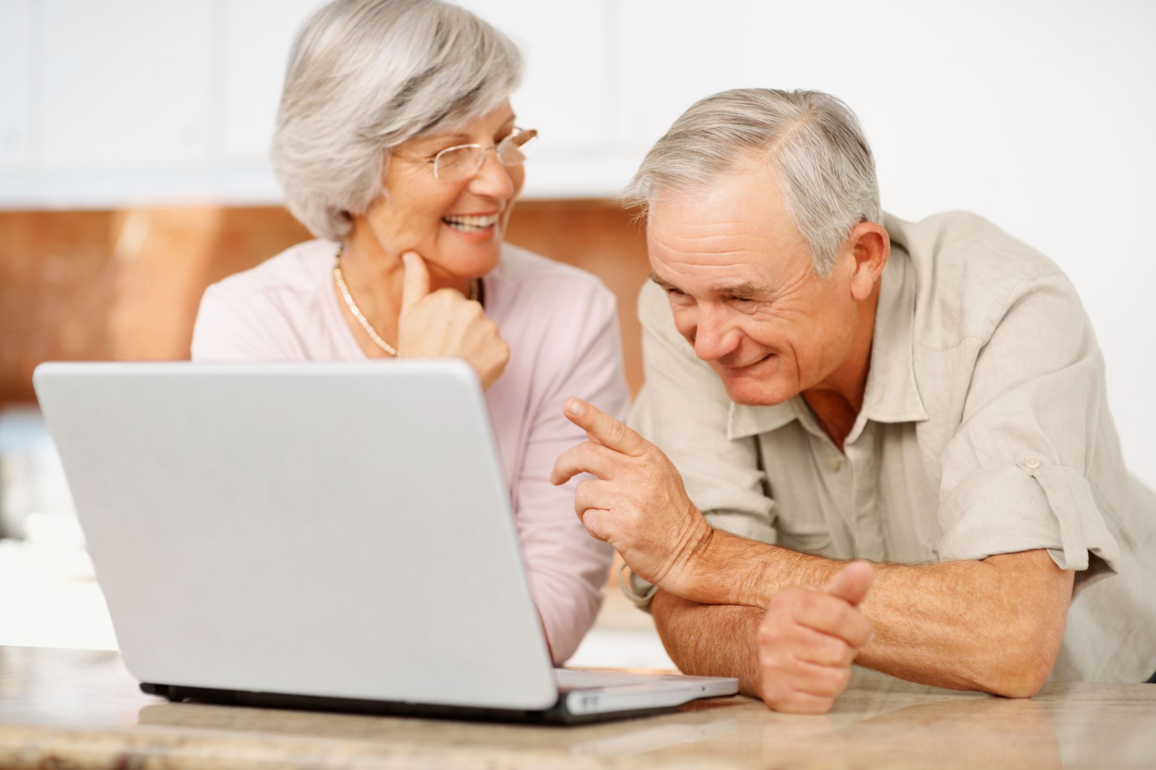 Technology-for-Seniors-Older-Couple-On-A-Laptop