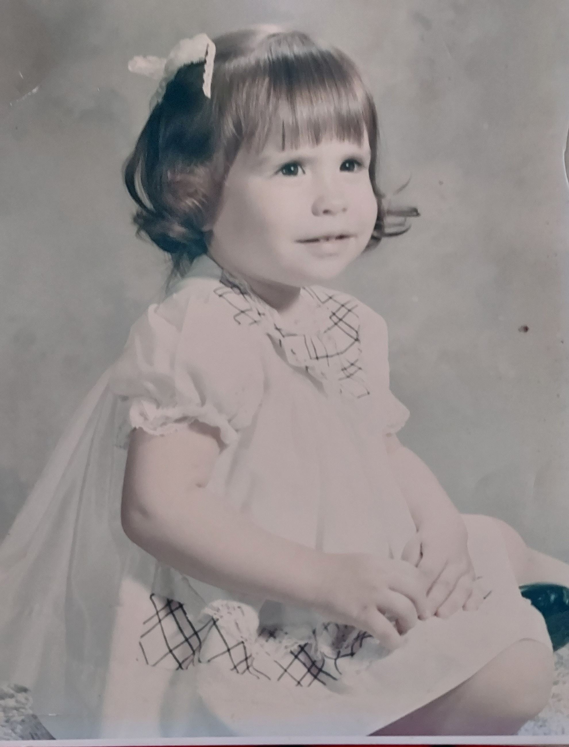 Young girl smiling at the camera