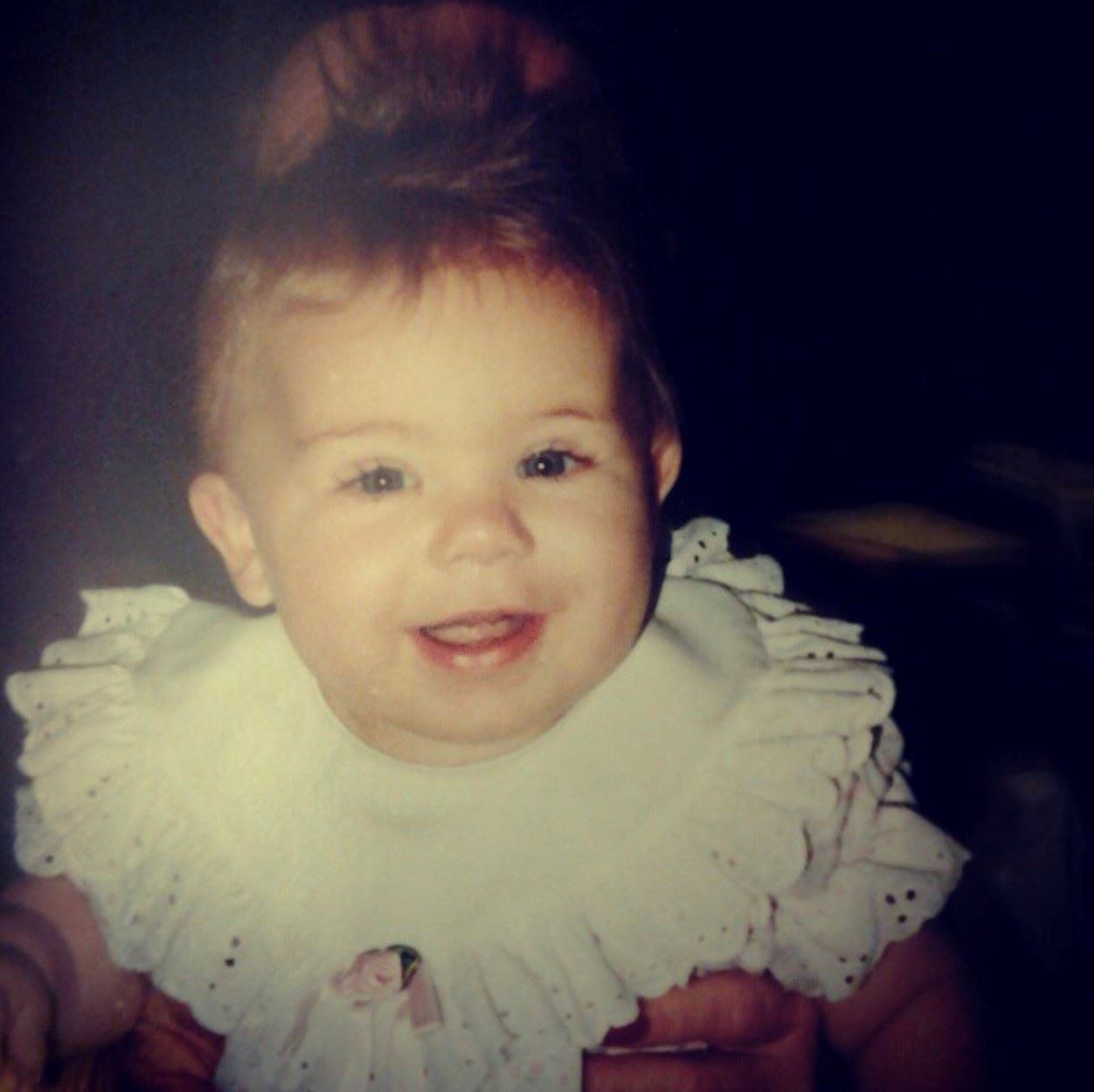 Young toddler looking at the camera