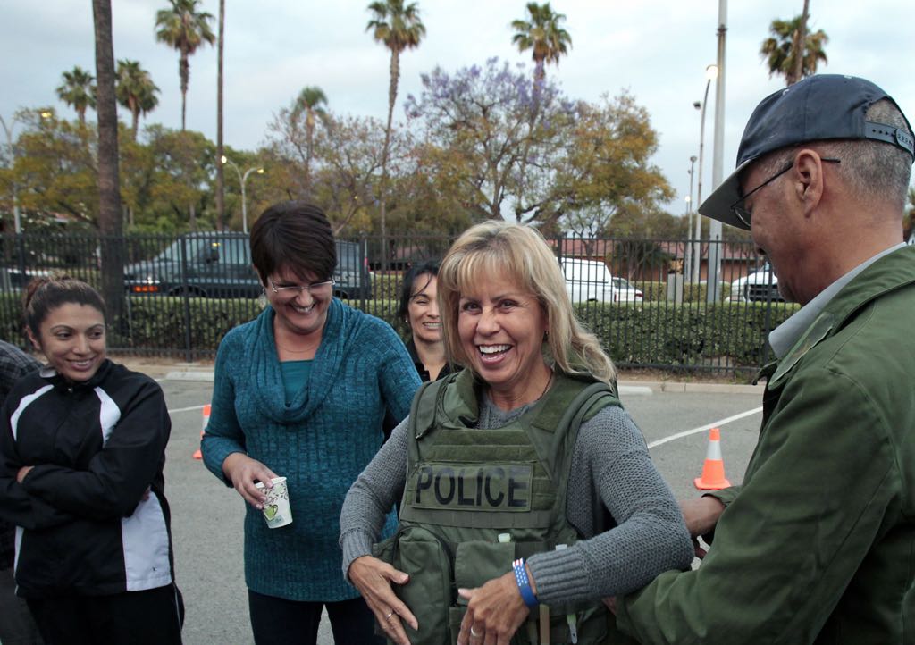 Citizens Academy Class - woman trying on vest